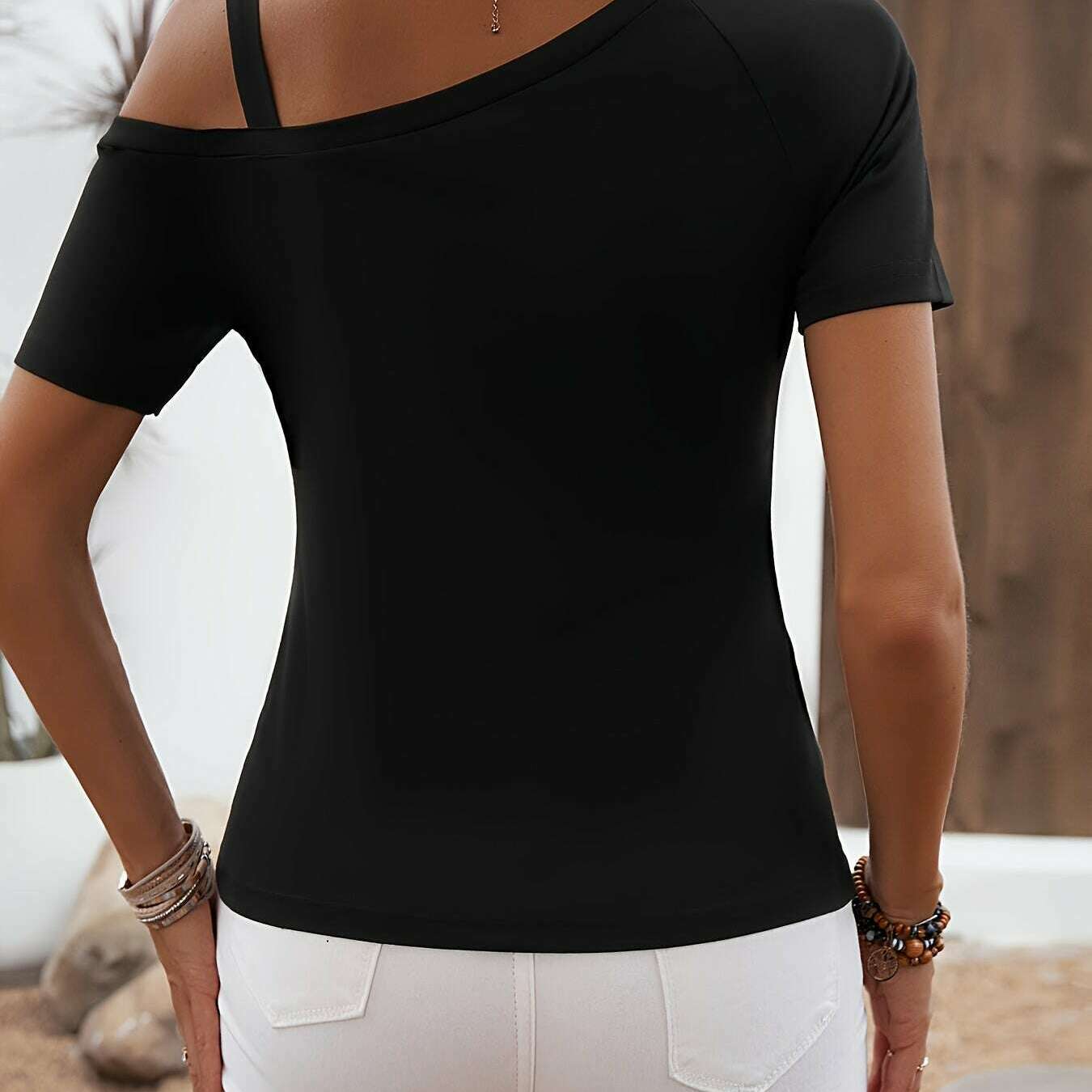 Ladies' off shoulder fashionable casual solid color T-shirt top