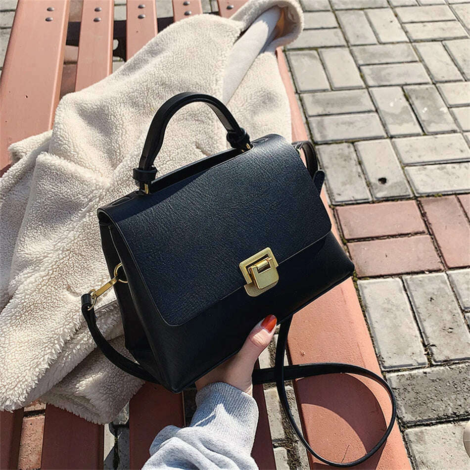 Chic Leather Top-Handle Bag with Gold Lock Closure
