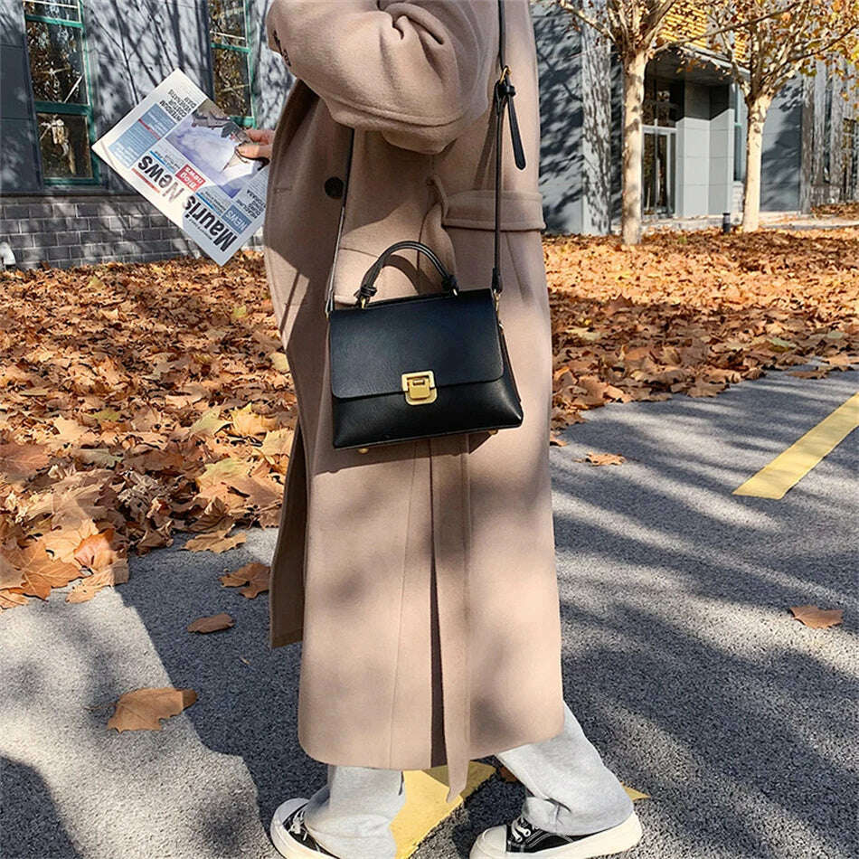 Chic Leather Top-Handle Bag with Gold Lock Closure