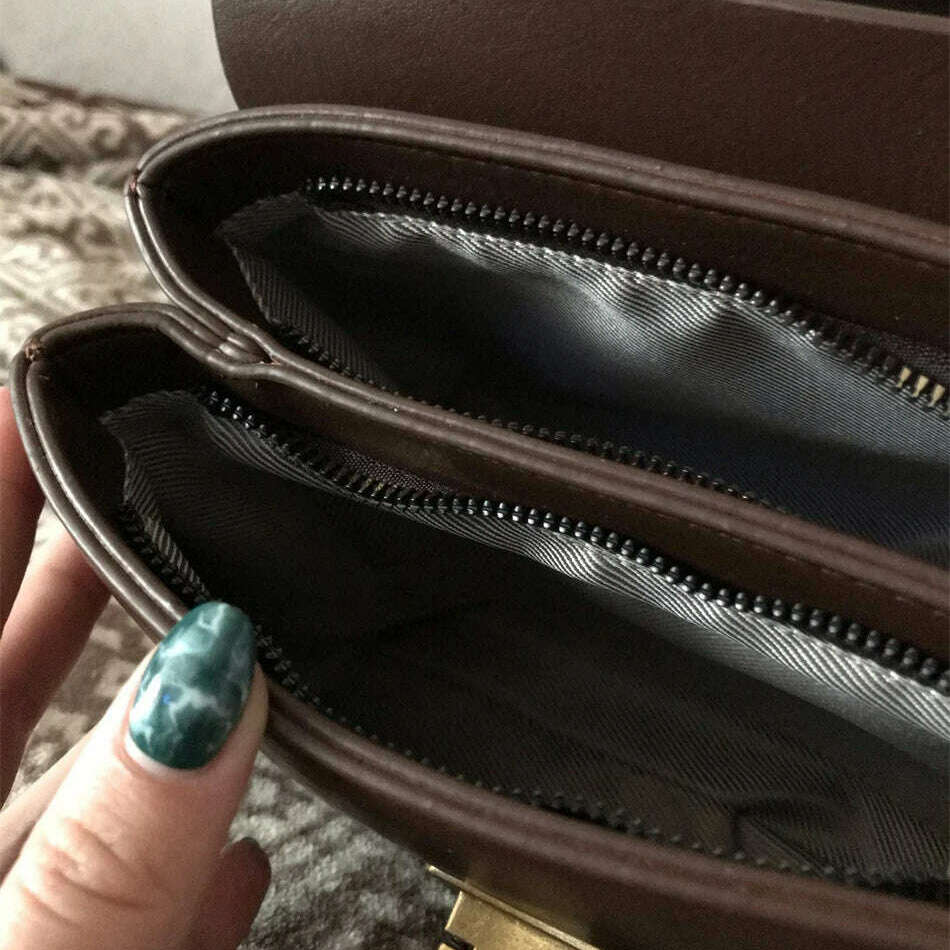 Chic Leather Top-Handle Bag with Gold Lock Closure