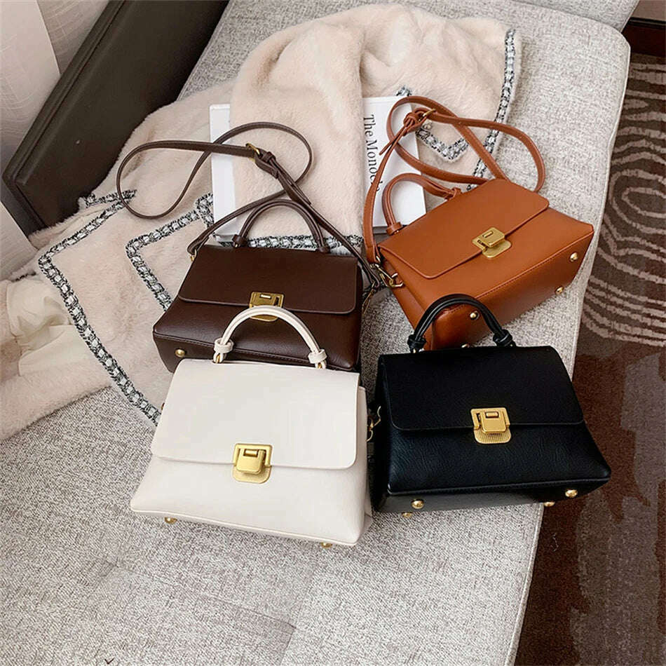 Chic Leather Top-Handle Bag with Gold Lock Closure