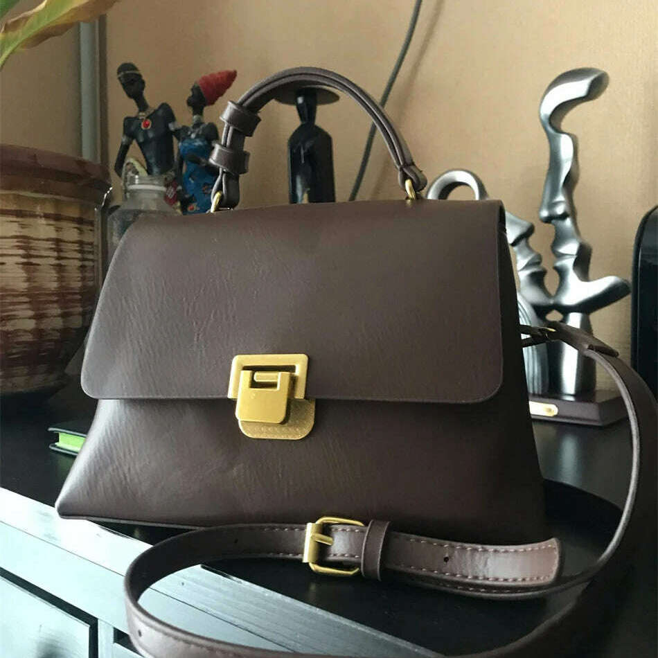 Chic Leather Top-Handle Bag with Gold Lock Closure