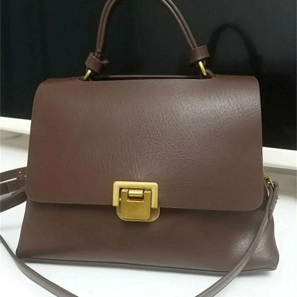 Chic Leather Top-Handle Bag with Gold Lock Closure