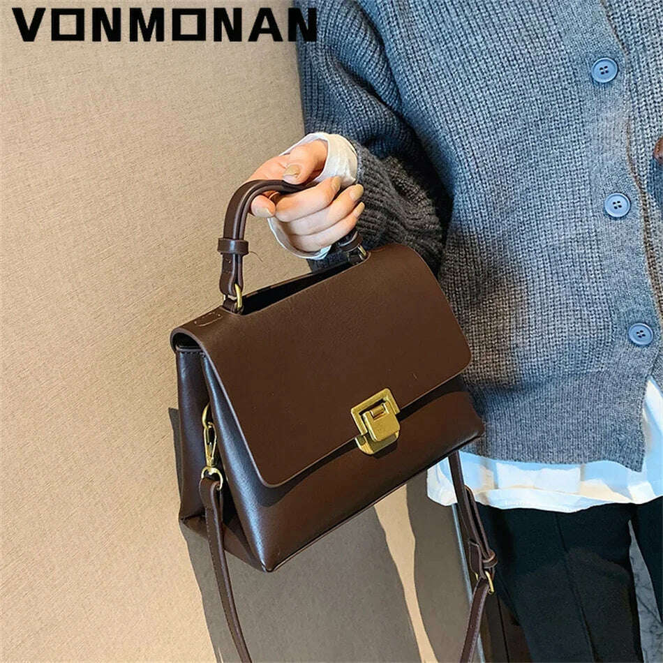 Chic Leather Top-Handle Bag with Gold Lock Closure