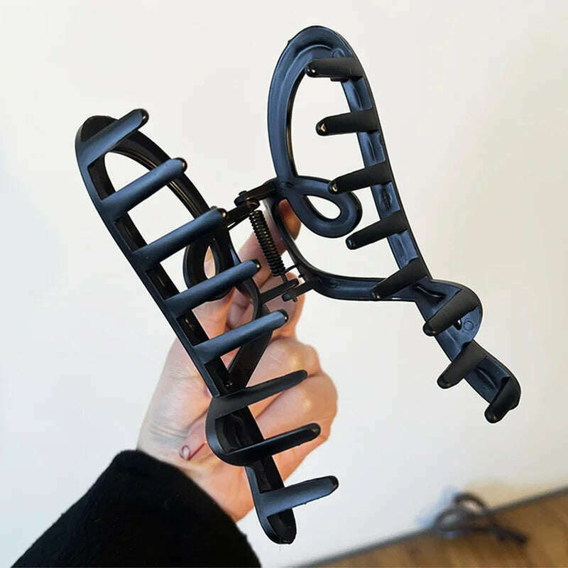 Heart-Shaped Plastic Hair Claw for Women.