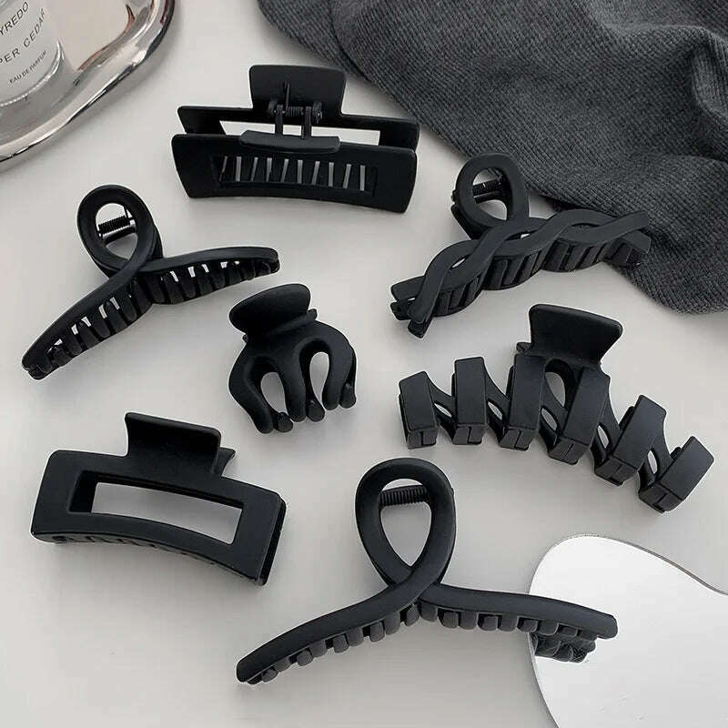 Large Black Letter Hair Clip.
