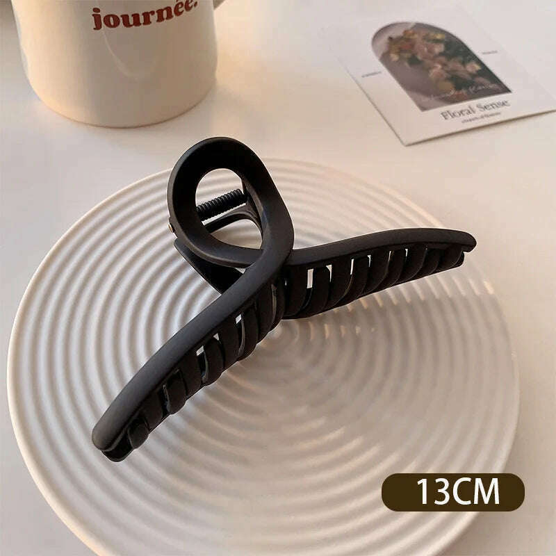 Large Black Letter Hair Clip.