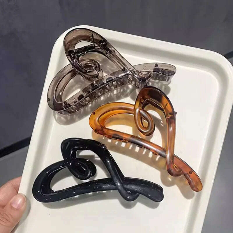 Heart-Shaped Plastic Hair Claw for Women.