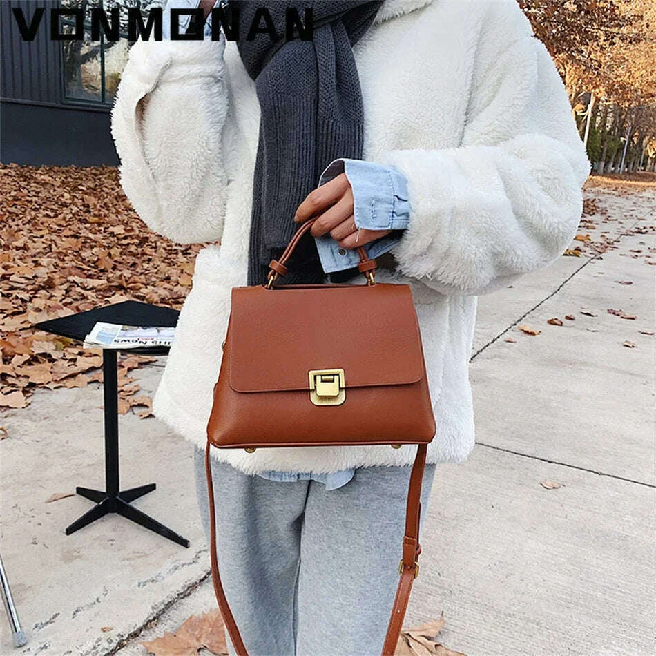 Chic Leather Top-Handle Bag with Gold Lock Closure