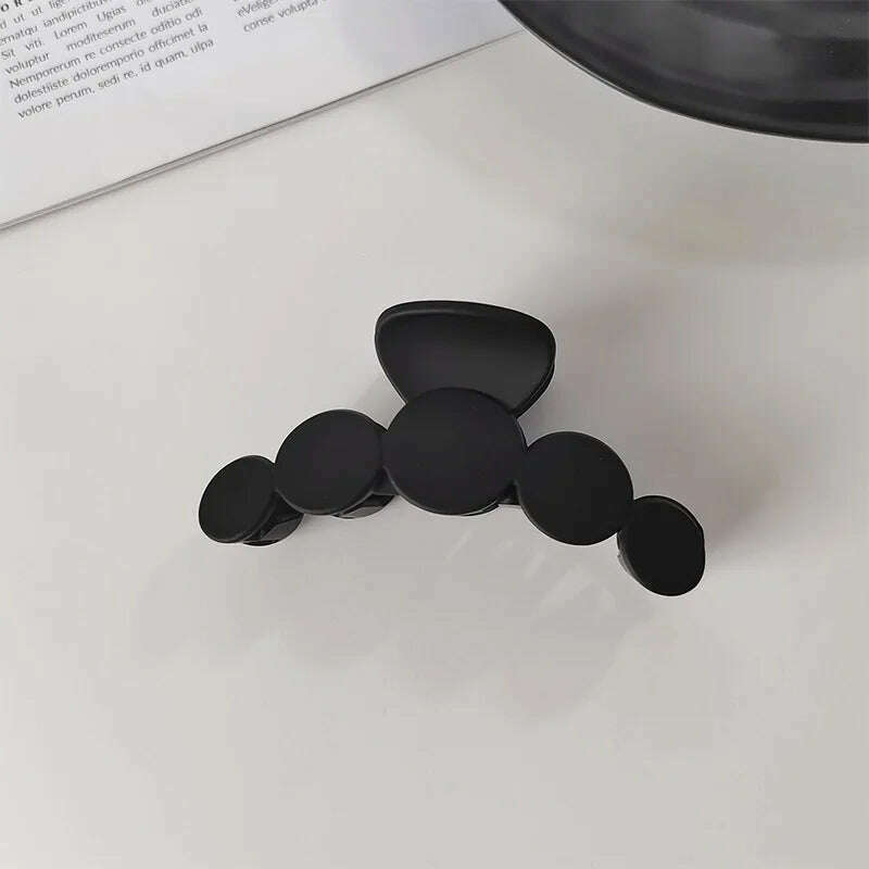 Elegant Black Geometric Hair Claw.