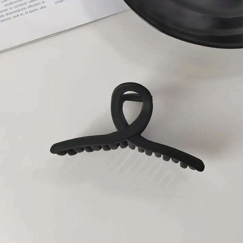 Elegant Black Geometric Hair Claw.