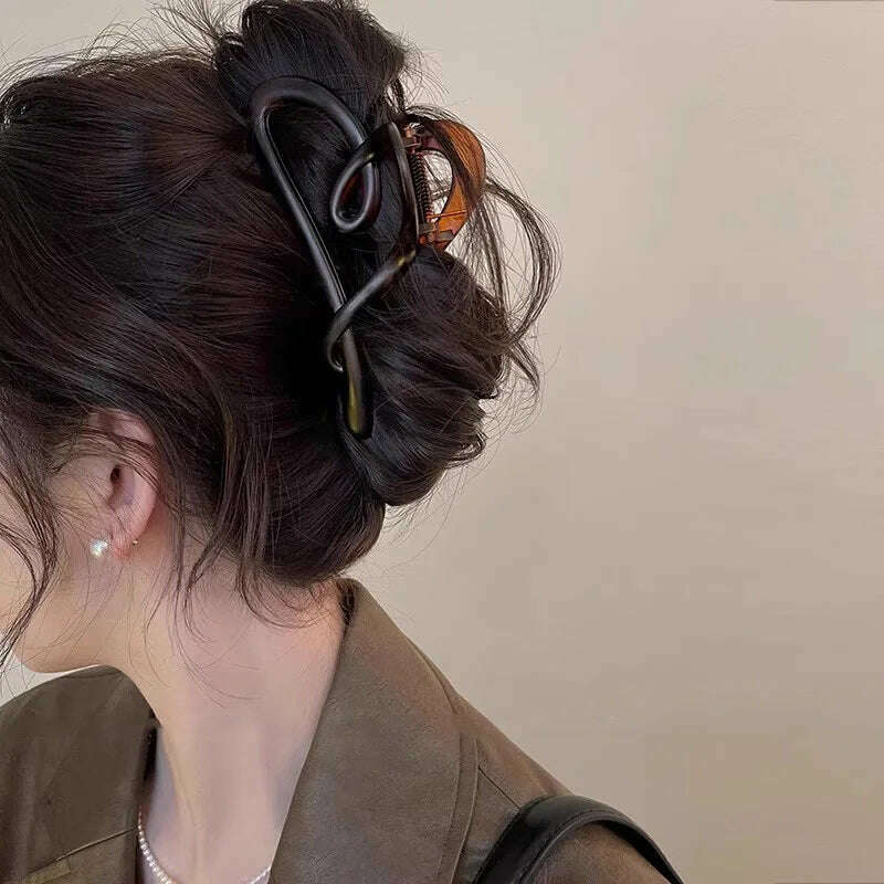 Heart-Shaped Plastic Hair Claw for Women.