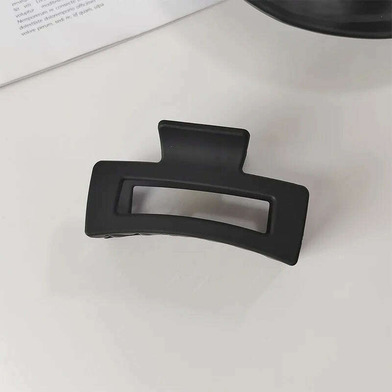 Elegant Black Geometric Hair Claw.
