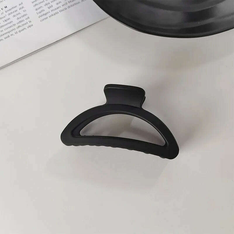 Elegant Black Geometric Hair Claw.