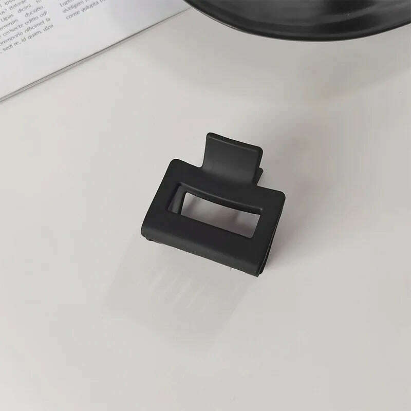 Elegant Black Geometric Hair Claw.