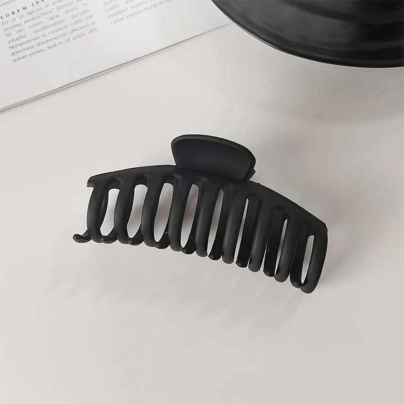 Elegant Black Geometric Hair Claw.