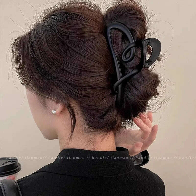 Heart-Shaped Plastic Hair Claw for Women.