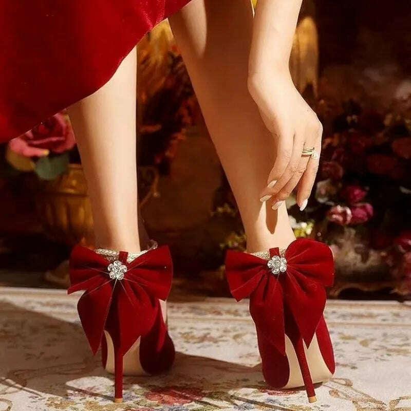 Red Xiuhe wedding shoes new pointy stiletto high heels female shallow mouth bow pearl one word buckle strap two wear bride shoes