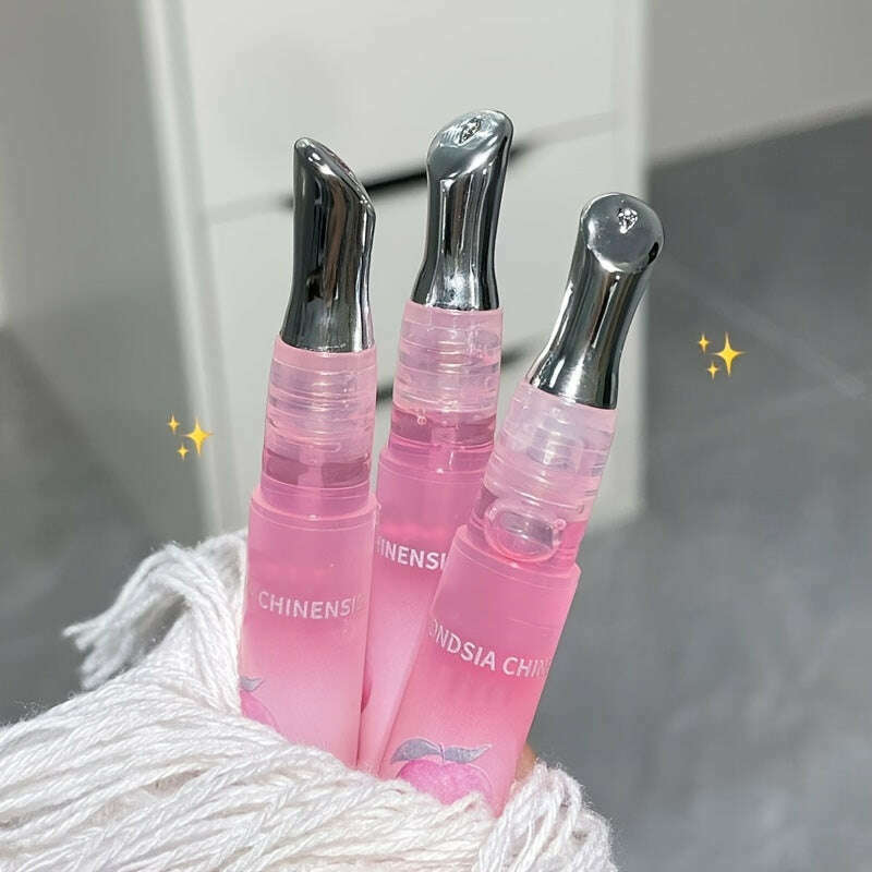 Peach Blossom Essence Lip Oil: Glossy, Moisturizing, Unisex