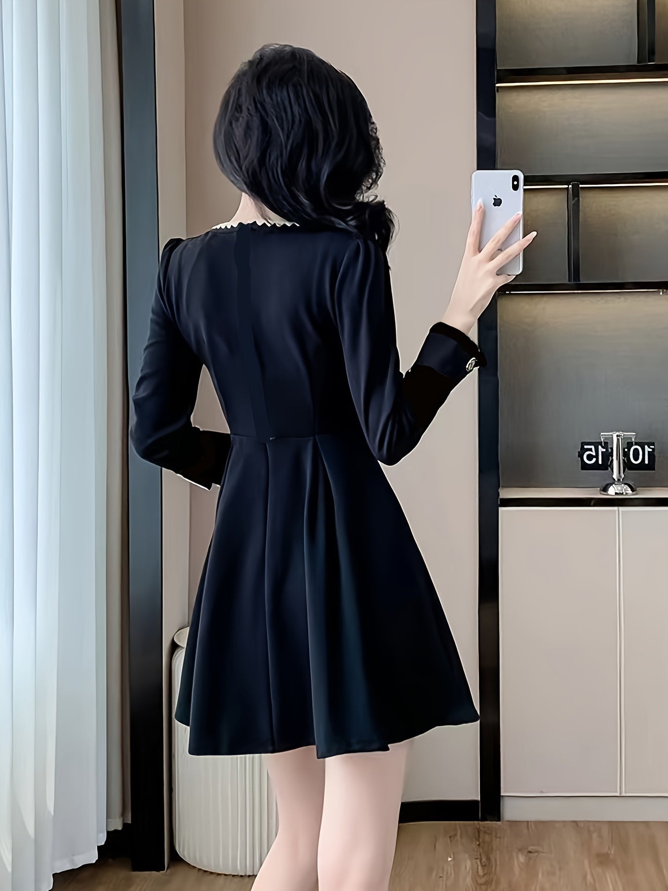 Chic Vintage-Inspired Black Dress with Waist Slimming Design