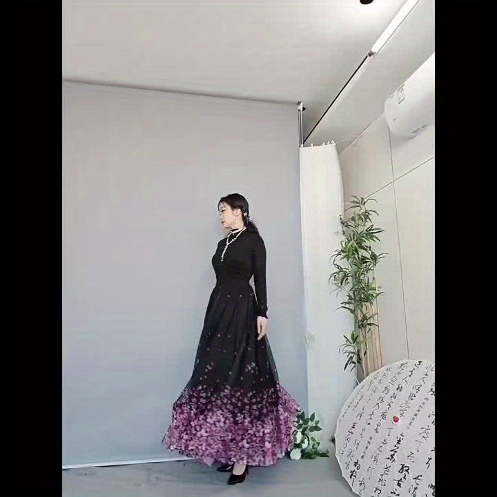 A Long Skirt That Flatters The Figure, Concealing Imperfections, Made of High-Quality Three-Layer Mesh Fabric with Floral Prints, Featuring a High Waist And a Flared Design.