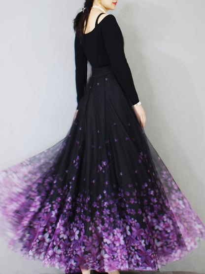 A Long Skirt That Flatters The Figure, Concealing Imperfections, Made of High-Quality Three-Layer Mesh Fabric with Floral Prints, Featuring a High Waist And a Flared Design.
